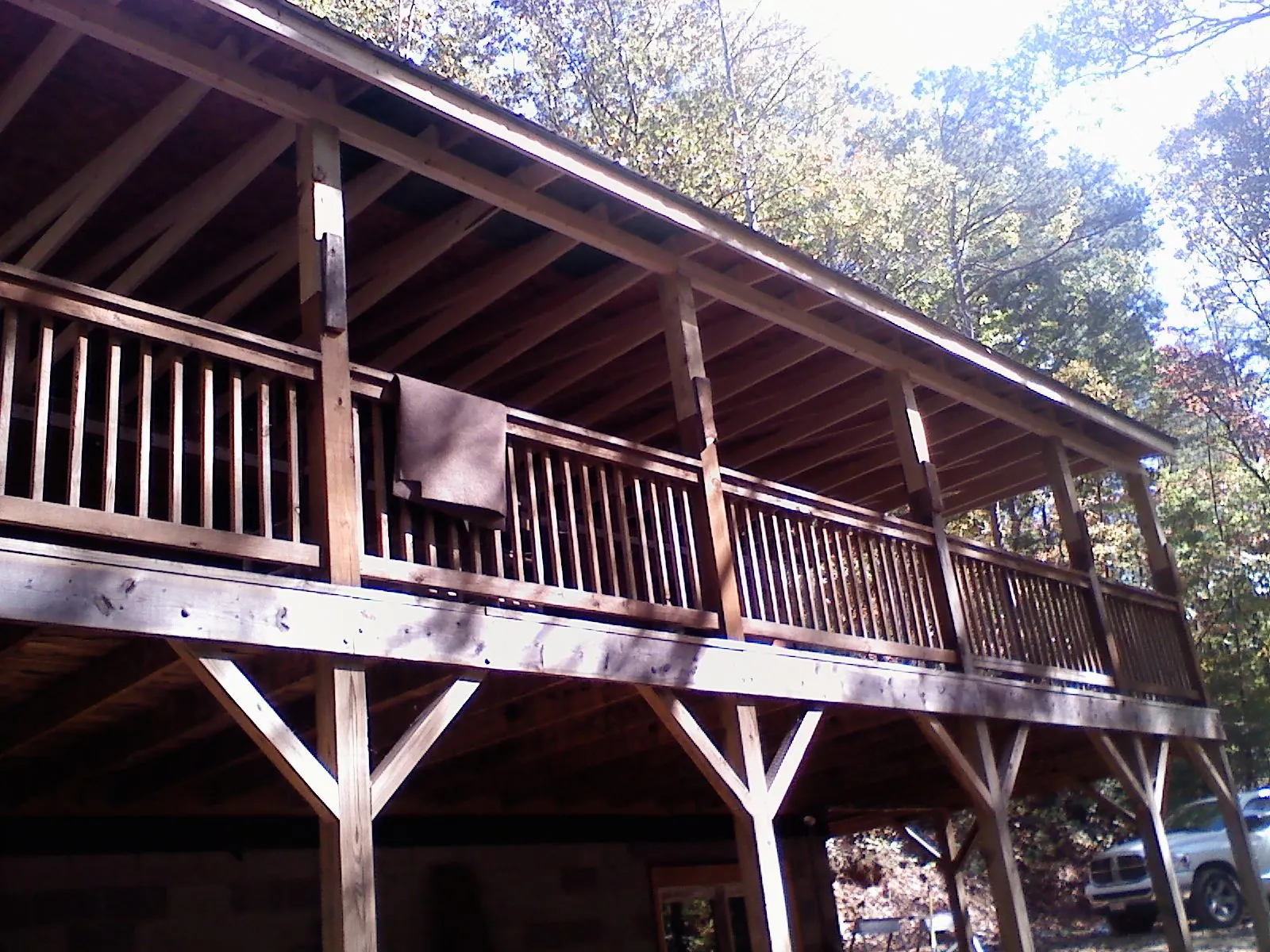 Timber framing under a new elevated porch and deck — Roof Leak Repair in Rotterdam Junction by Roofing Brothers